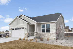 View of front of property featuring a garage