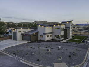 View of front of home featuring a mountain view