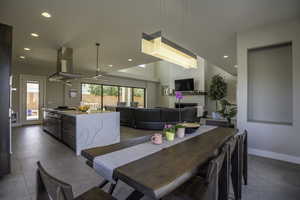 Dining space featuring tile floors