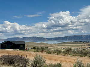 Property view of mountains featuring a rural view