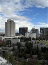 View of Wasatch mountains and city from balcony