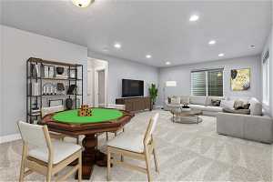 Virtually staged recreation room with a textured ceiling and light colored carpet. This room is large enough for a  large sectional plus a pool table, VR space or a card table