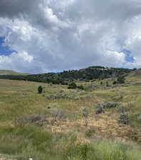 View of mountain feature with a rural view