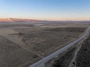 Aerial view at dusk with a mountain view and a rural view