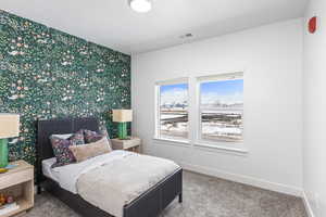 Bedroom 2 featuring carpet floors