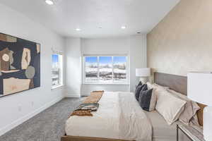 Primary Bedroom featuring carpet floors