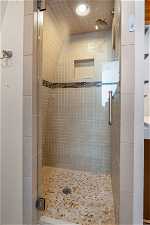 Bathroom with an enclosed shower.