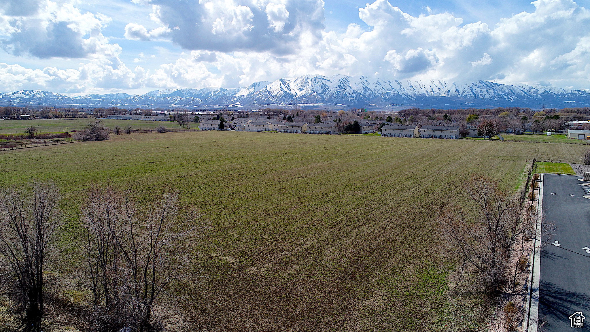 Bird's eye view looking west with view of the Wellsville Mountains along north side of property