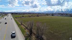 Birds eye view of property showing highway frontage along the east side of property
