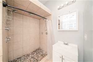 Master Bathroom with walk in shower and large vanity