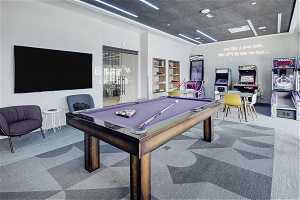 Playroom with pool table and carpet