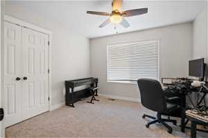 Office with new carpet and ceiling fan
