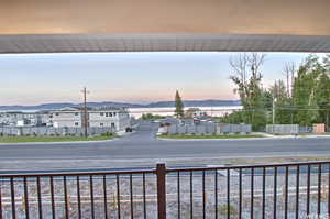 Property view of water featuring a mountain view and Lake View. Stunning Sunrises.