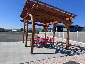 View of patio featuring a pergola