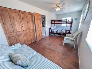 Large upper level bedroom with refurbished English tongue & groove wood