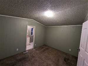 Unfurnished bedroom featuring carpet flooring, new paint and updates to bathroom