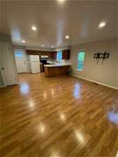 Unfurnished Dinining open to kitchen and has door to back deck, access to yar