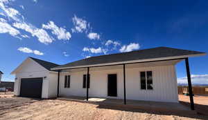 View of front of house featuring a garage