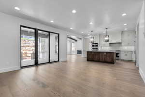 Interior space with plenty of natural light and light wood-type flooring