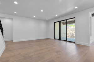 Empty room with light wood-type flooring