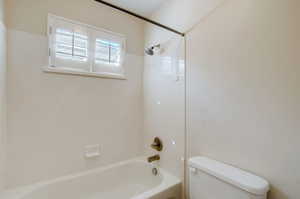 Bathroom with  shower combination and toilet