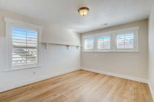 Empty room featuring light hardwood / wood-style flooring