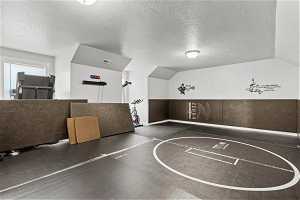 Bonus room can be used as media room or as a gym as shown here.  Mats will be removed, flooring is LVP
