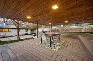Wooden deck with a patio