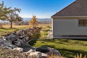 View of yard with a mountain view