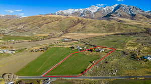 Drone / aerial view with a rural view and a mountain view