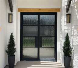 Entrance to property with french doors