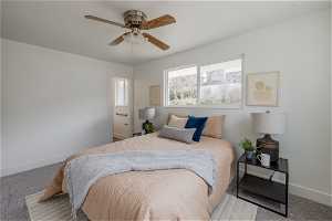 Bedroom featuring carpet floors and ceiling fan