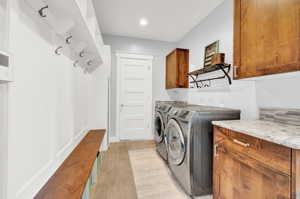 Laundry Room w/ Door to 1/2 Bathroom