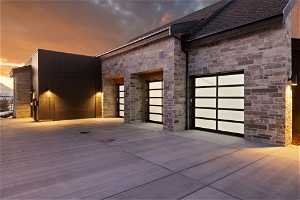 View of front of house with over sized 4 car garage