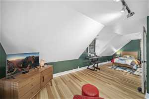 Bedroom 2, Vaulted Ceilings, Track Lighting, Custom Trim, Wood Floors, Handmade Door