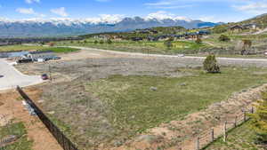 View of lot  from southeast corner featuring mountainous views