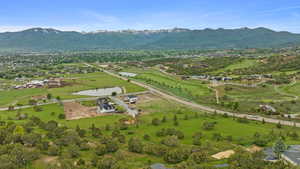 Aerial view from top of hill east of Lot 3 featuring Red Ledges and mountainous views