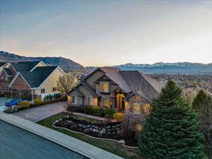 View of front of home featuring a mountain view