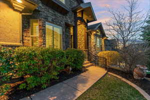 View of property exterior at dusk