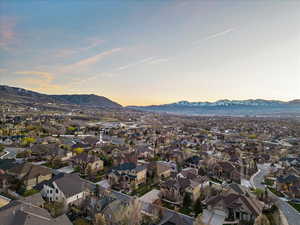 Aerial view at dusk featuring a mountain view