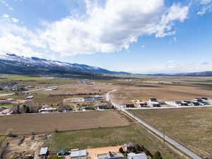 Drone / aerial view featuring a rural view and a mountain view