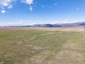 Aerial view with a rural view and a mountain view