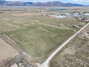 Birds eye view of property featuring a rural view and a mountain view