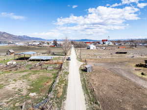 Drone / aerial view featuring a rural view and a mountain view