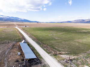 Property view of mountains with a rural view