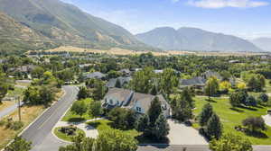 Birds eye view of property featuring a mountain view