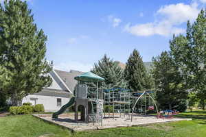 View of play area with a yard