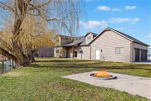 Large Yard with Firepit and Lake Access