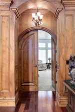 Double door entrance into primary bedroom