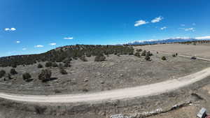 Property view of mountains featuring a rural view